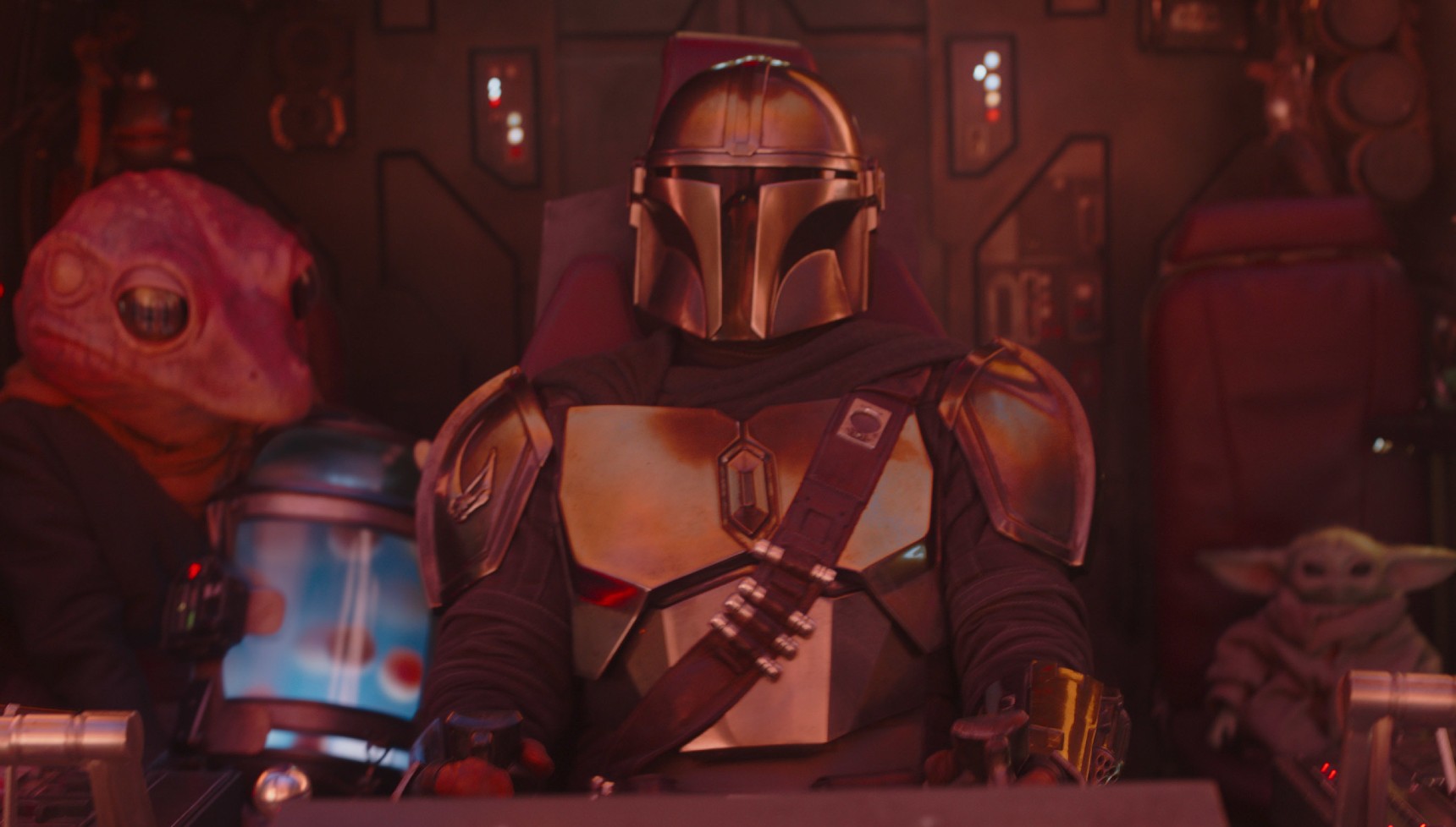Mando and Grogu in a spaceship with an alien in The Mandalorian season 1