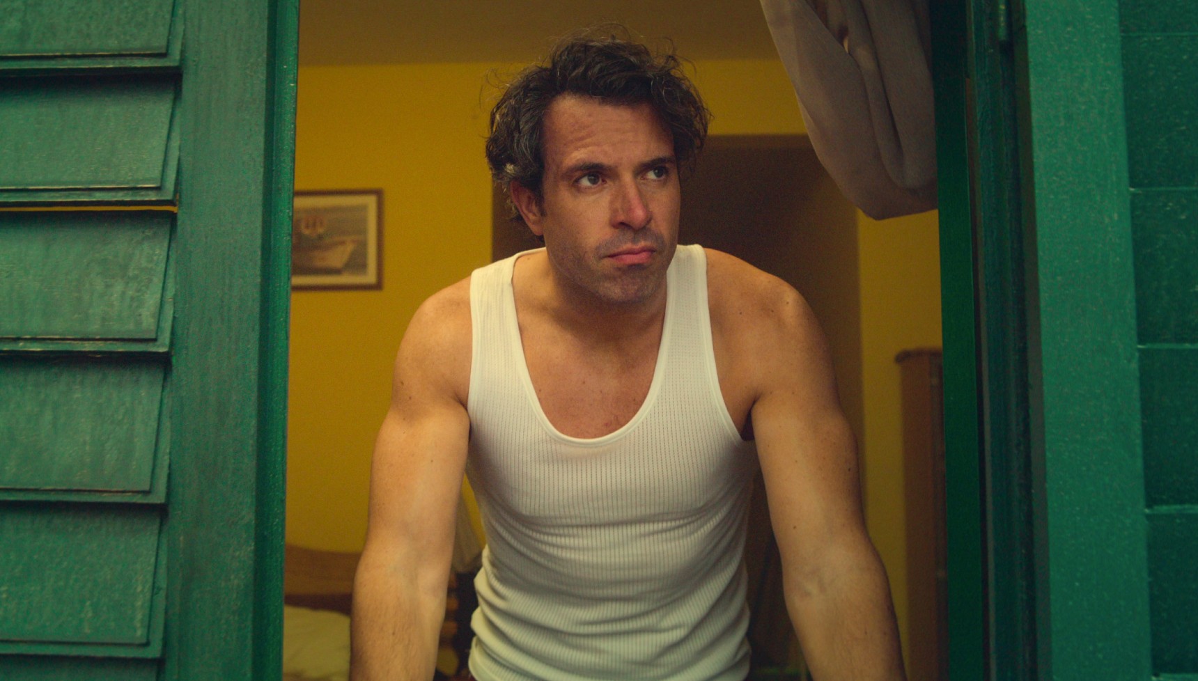 Tom Cullen in a vest as John Palmer in The Gold