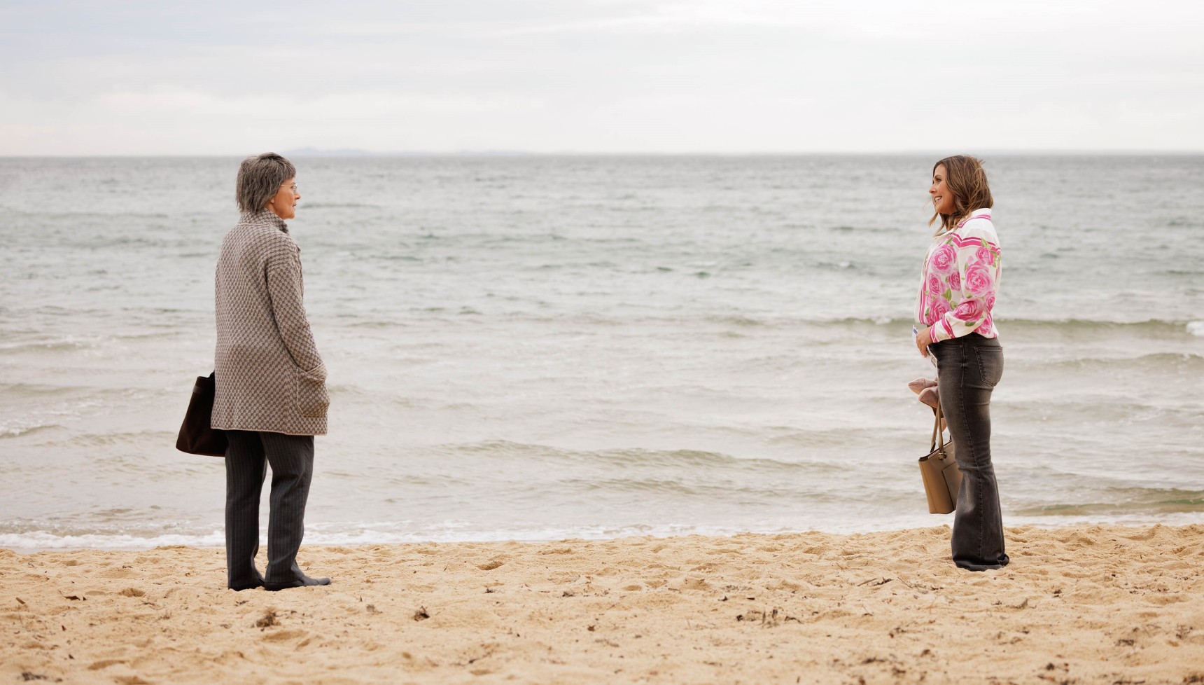 Helen and Amanda meet for the first time on the beach in The Imposter