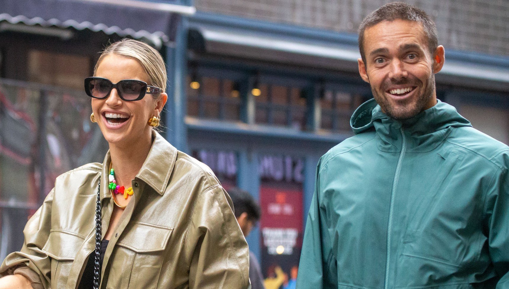 Husband and wife Spencer Matthews and Vogue Williams walking down the street together