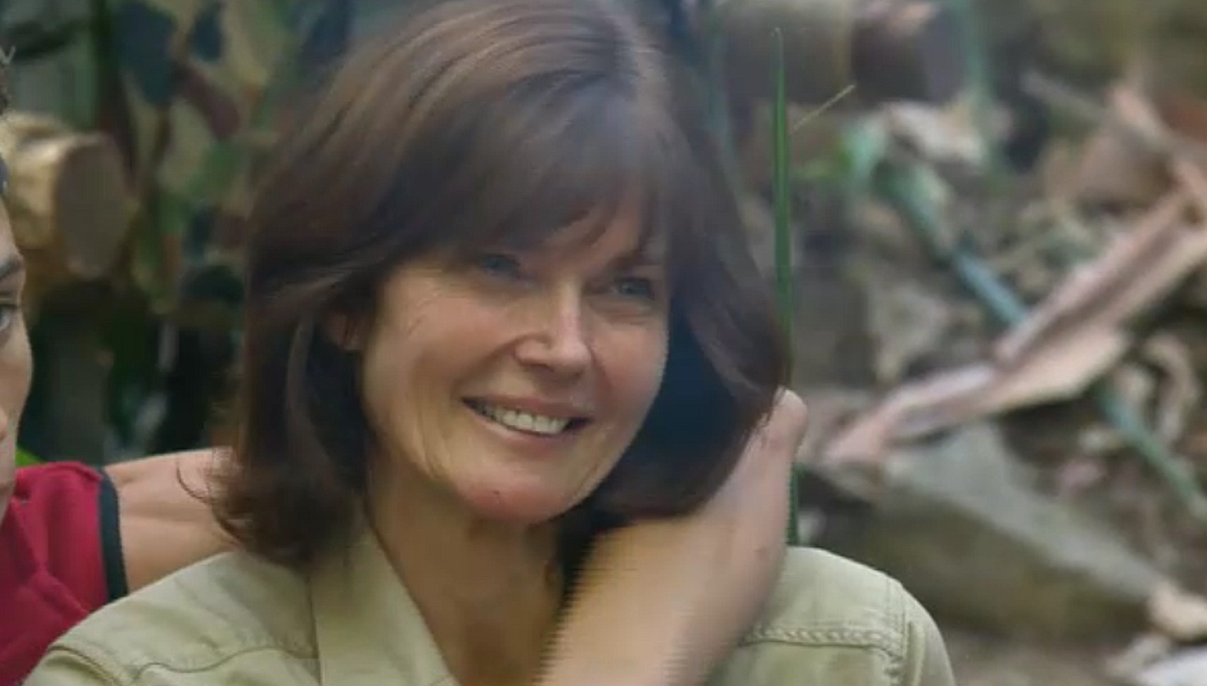 Annabel Giles smiling in the jungle in I'm A Celebrity