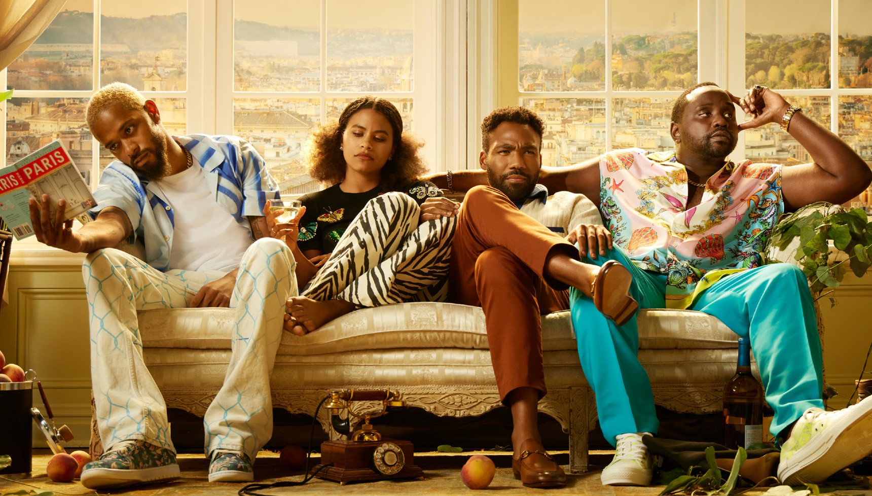 LaKeith Stanfield, Zazie Beetz, Donald Glover and Brian Tyree Henry's Atlanta characters sit together on a couch
