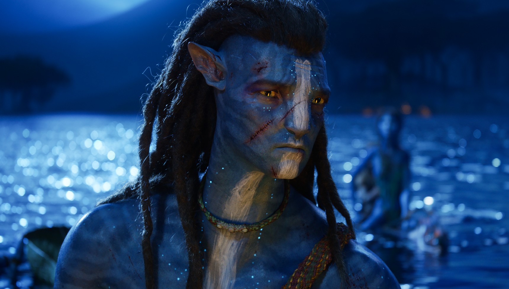 Jake Sully as an Avatar sitting in the sea at night