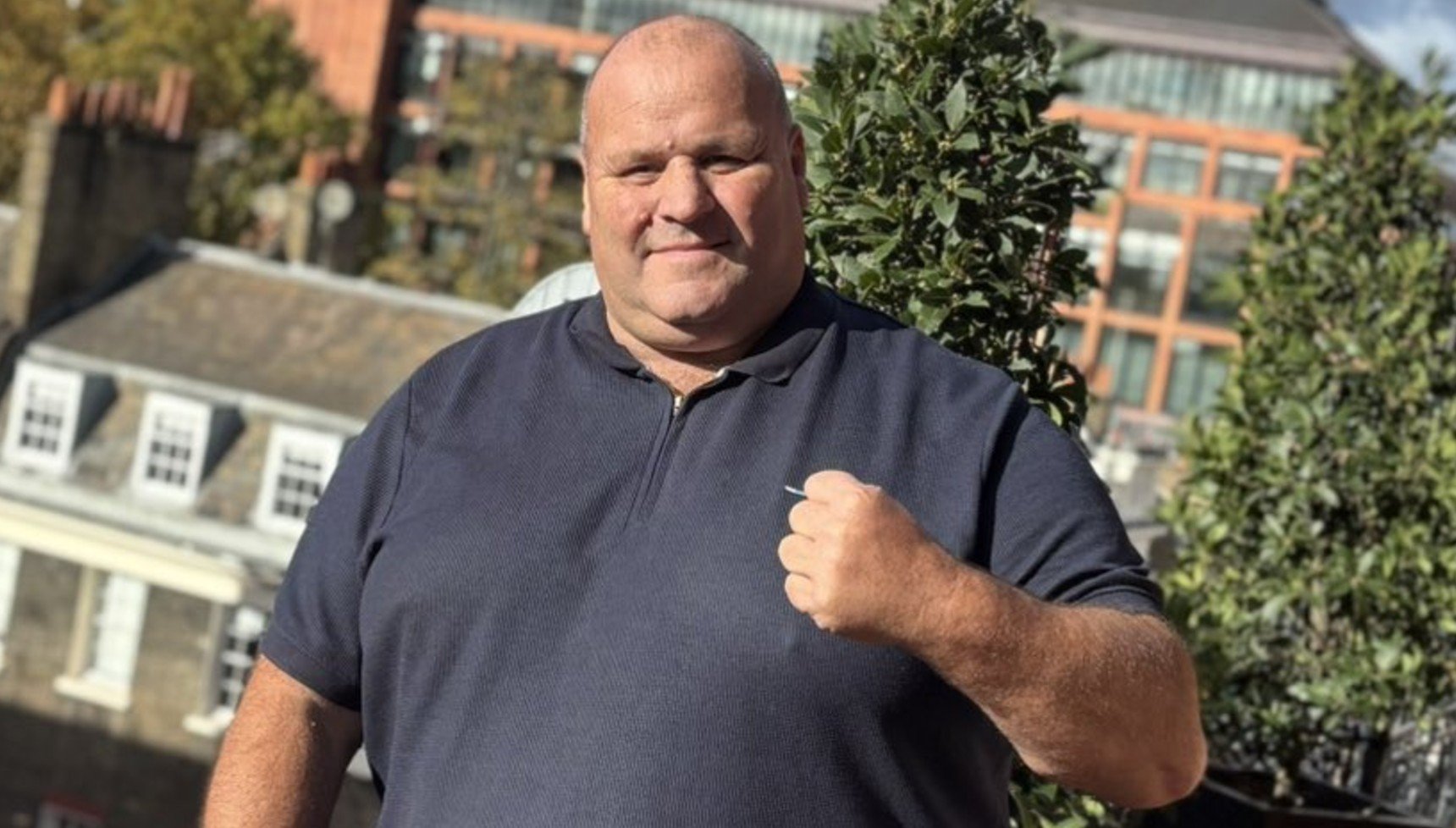 John Fisher (Big John) with a clenched fist 