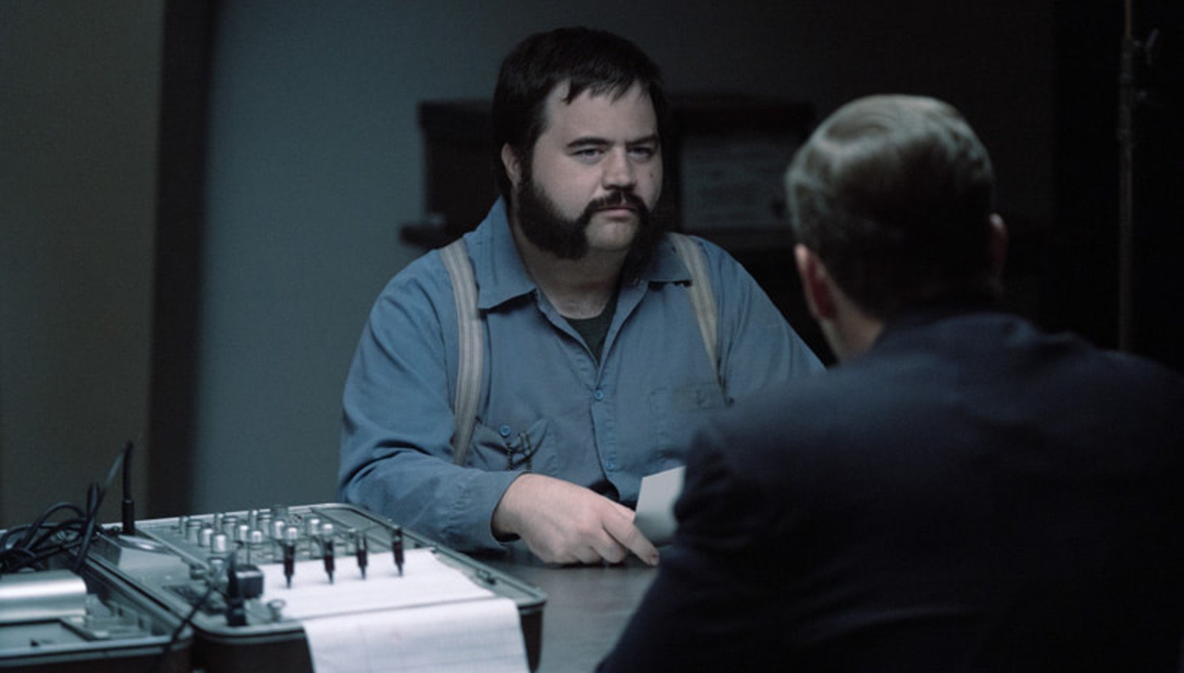 Paul Walter Hauser's Black Bird character in an interrogation room