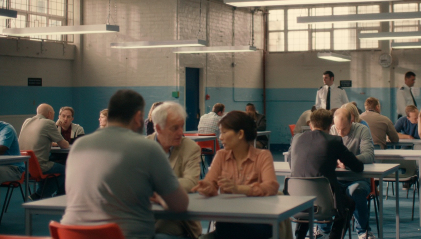 Inmates meeting family and friends in a prison in Broadchurch