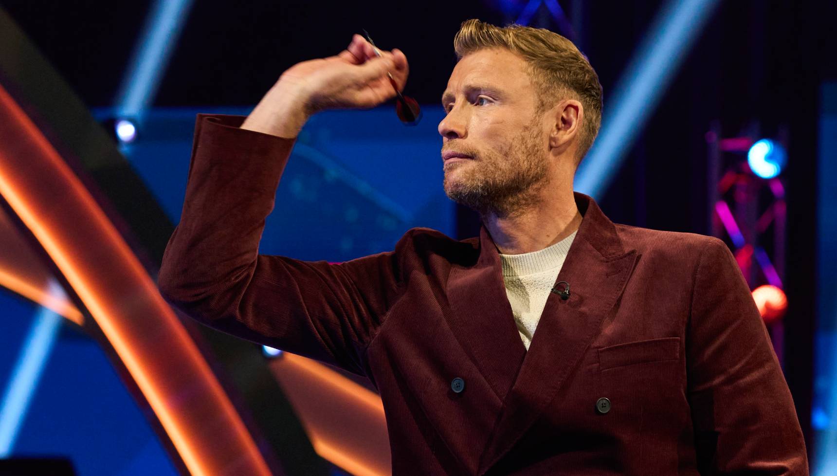 Freddie Flintoff throwing a dart on Bullseye