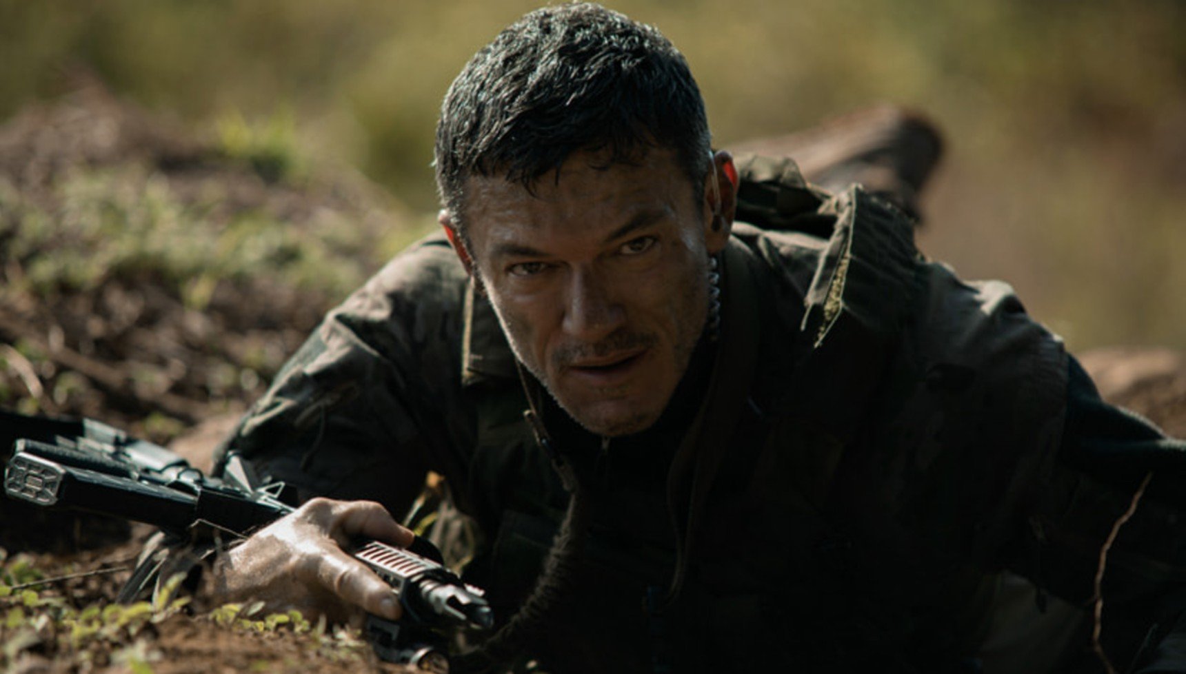 A soldier lay on the ground