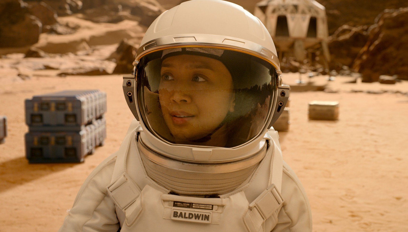 Female astronaut smiling in For All Mankind