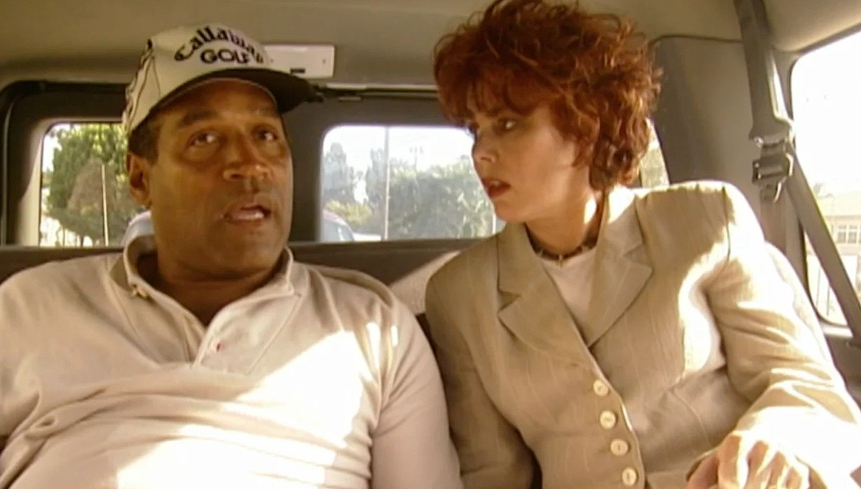 Ruby Wax sitting in a car with OJ Simpson