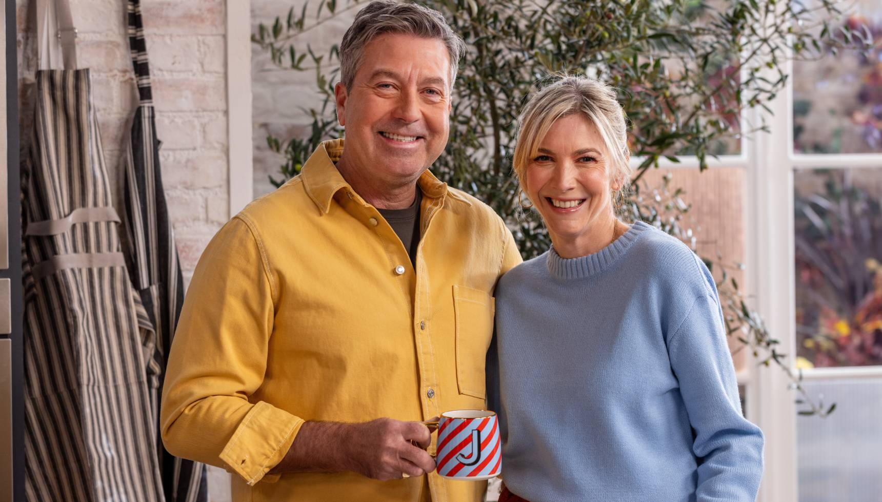 John Torode and Lisa Faulkner hosting their Weekend Kitchen show