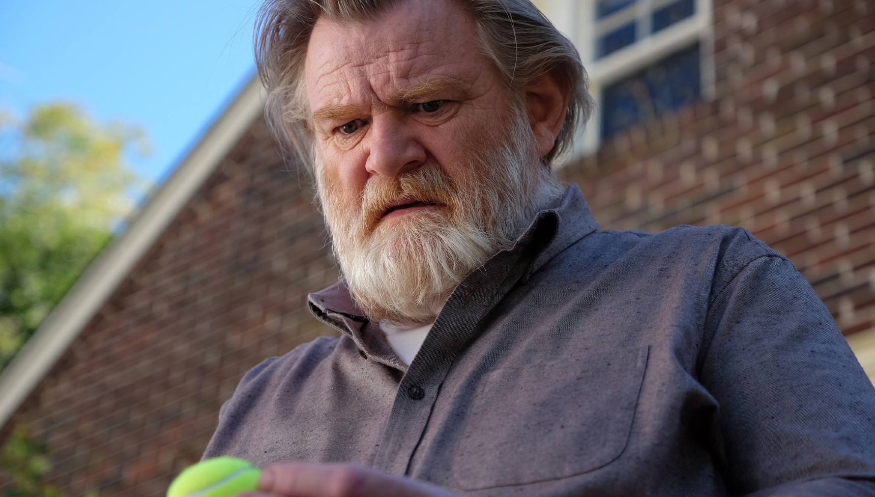 Brendan Gleeson holding a tennis ball in Mr Mercedes