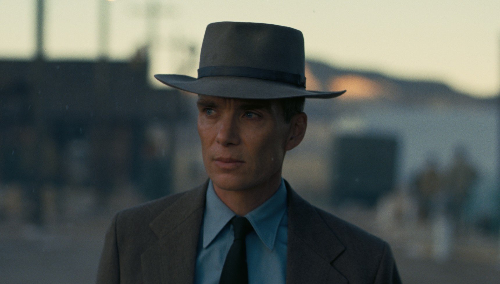 Cillian Murphy wearing a grey hat in Oppenheimer