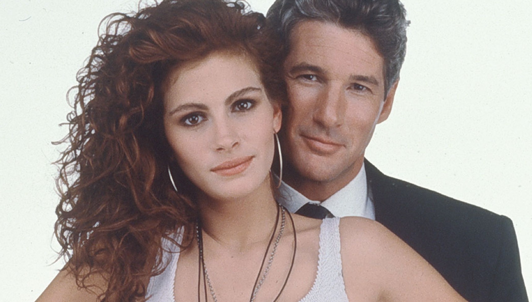 Richard Gere standing behind Julia Roberts in Pretty Woman