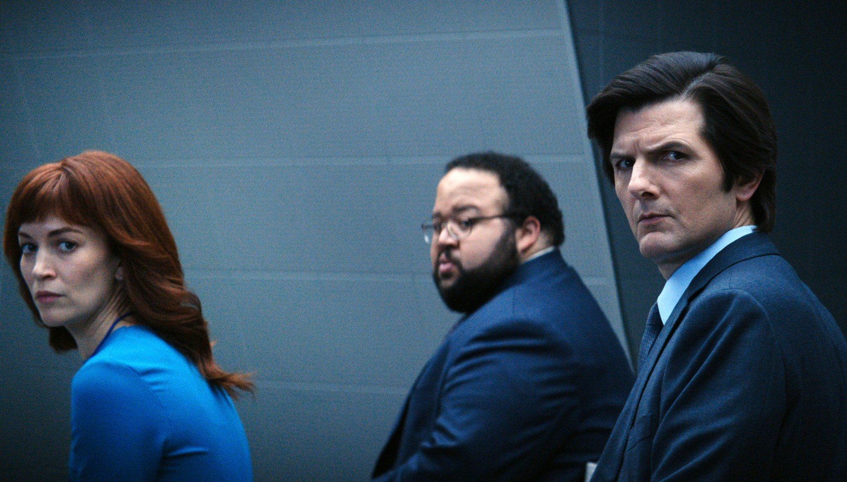 Three Severance characters looking in the same direction