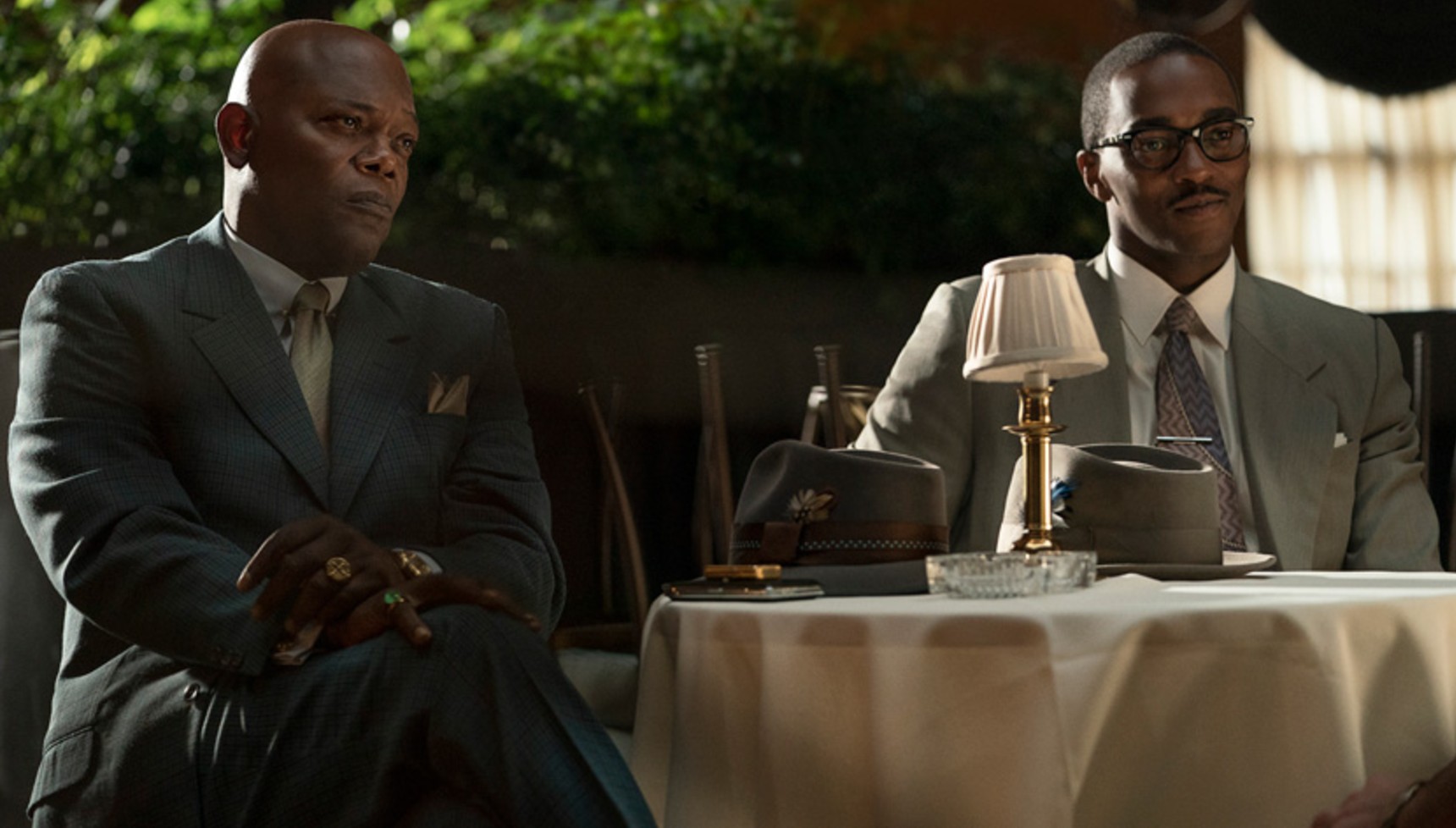 Samuel L. Jackson and Anthony Mackie sat at a table