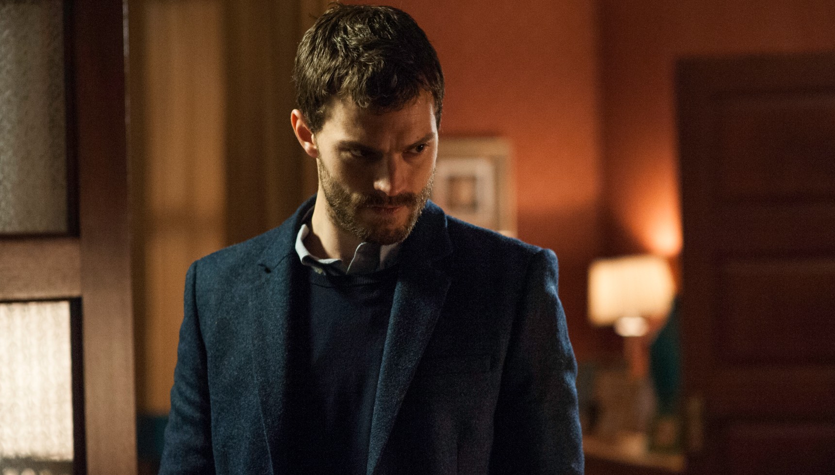 Jamie Dornan's serial killer in a house in The Fall