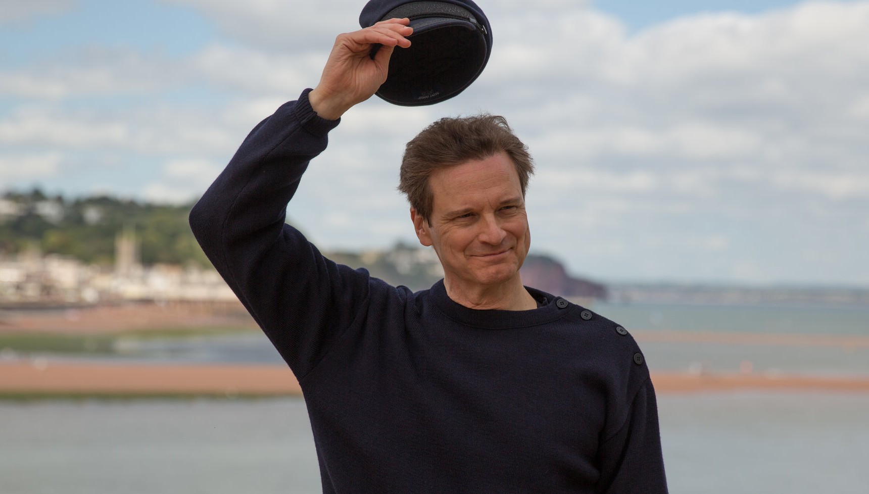 Colin Firth tipping his hat in The Mercy 
