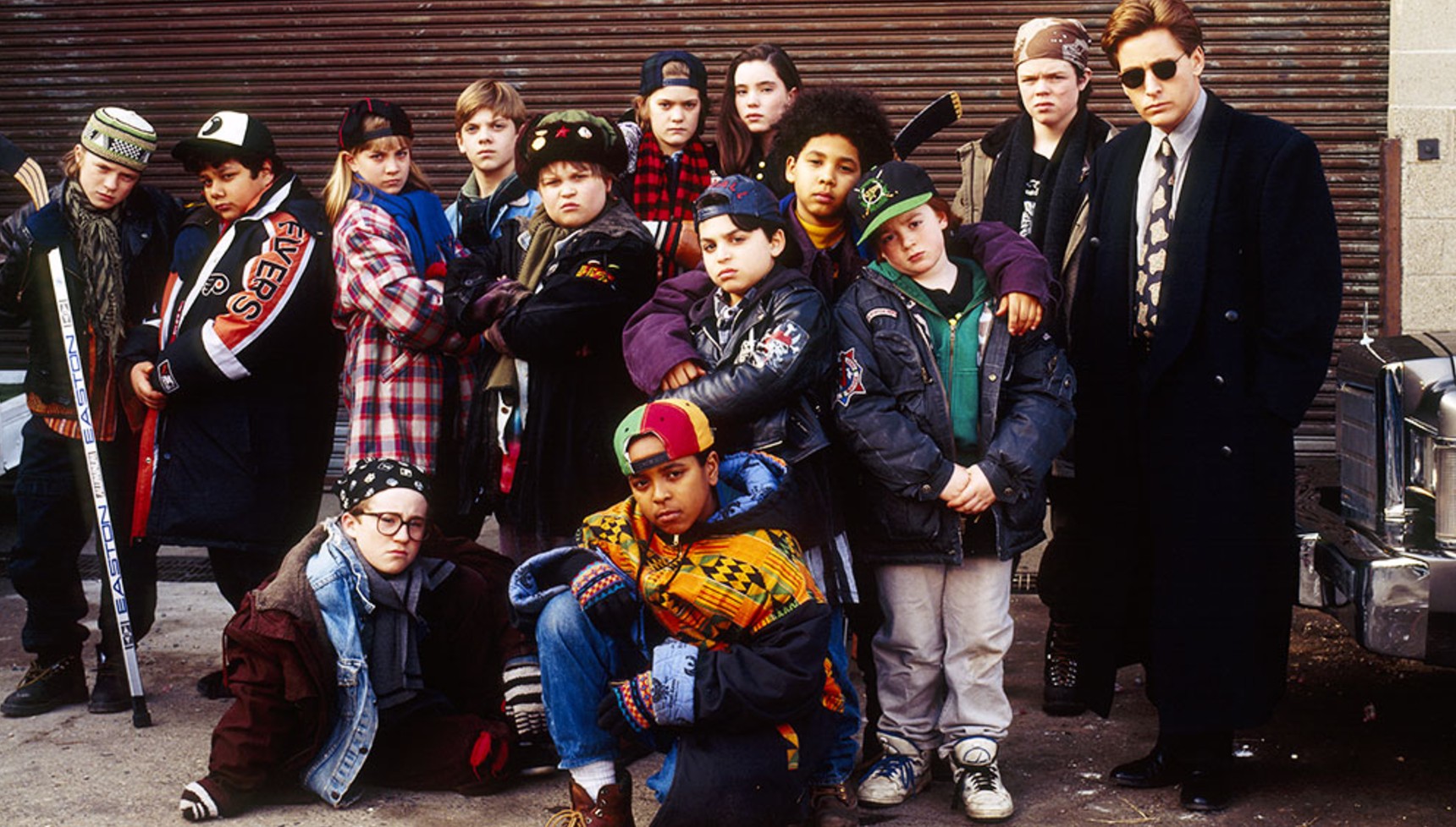 Emilio Estevez and the young cast of The Mighty Ducks