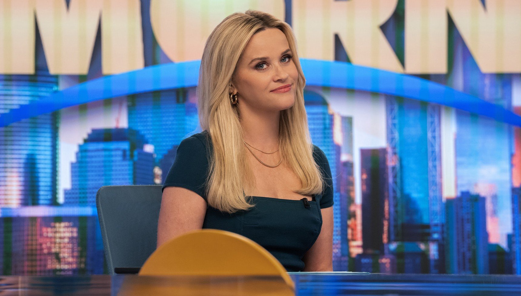 Blonde TV presenter smiling in The Morning Show