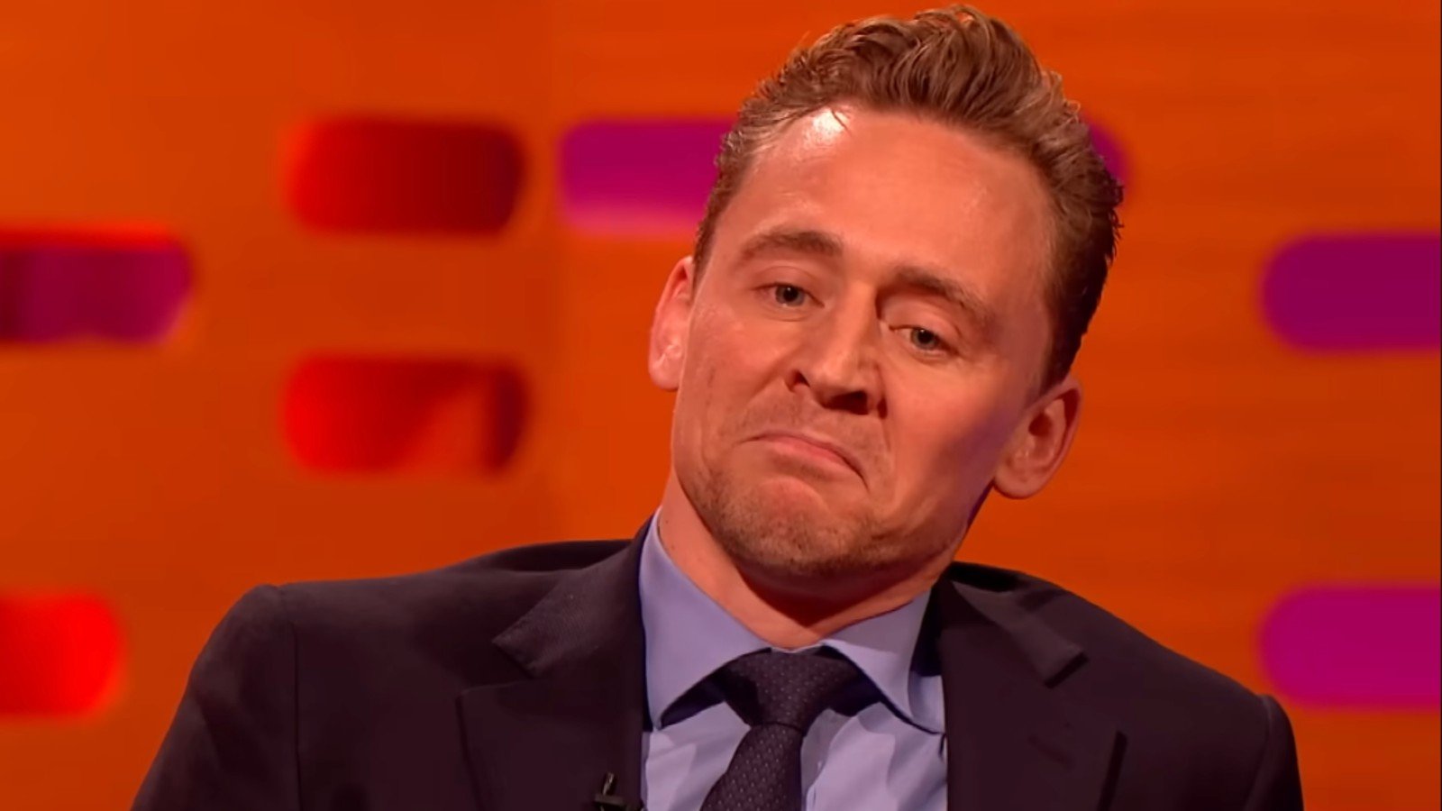 Tom Hiddleston making a frowning face to impersonate Robert De Niro on The Graham Norton Show