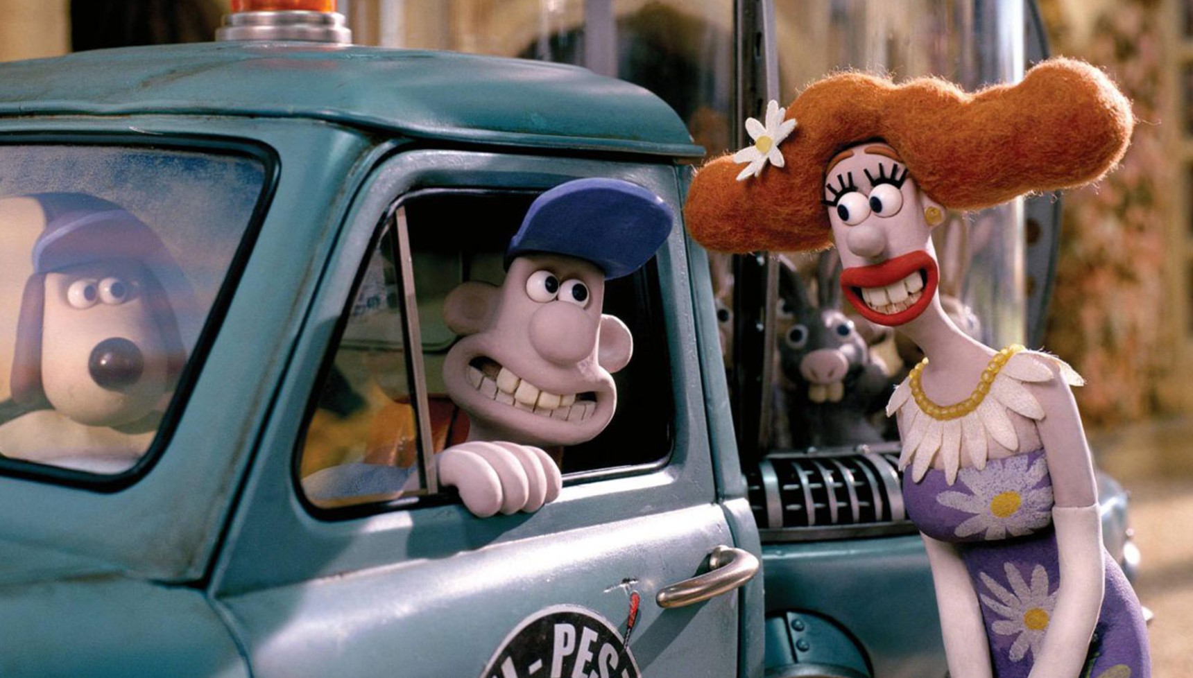 Gromit and Wallace in a truck next to Lady Tottington