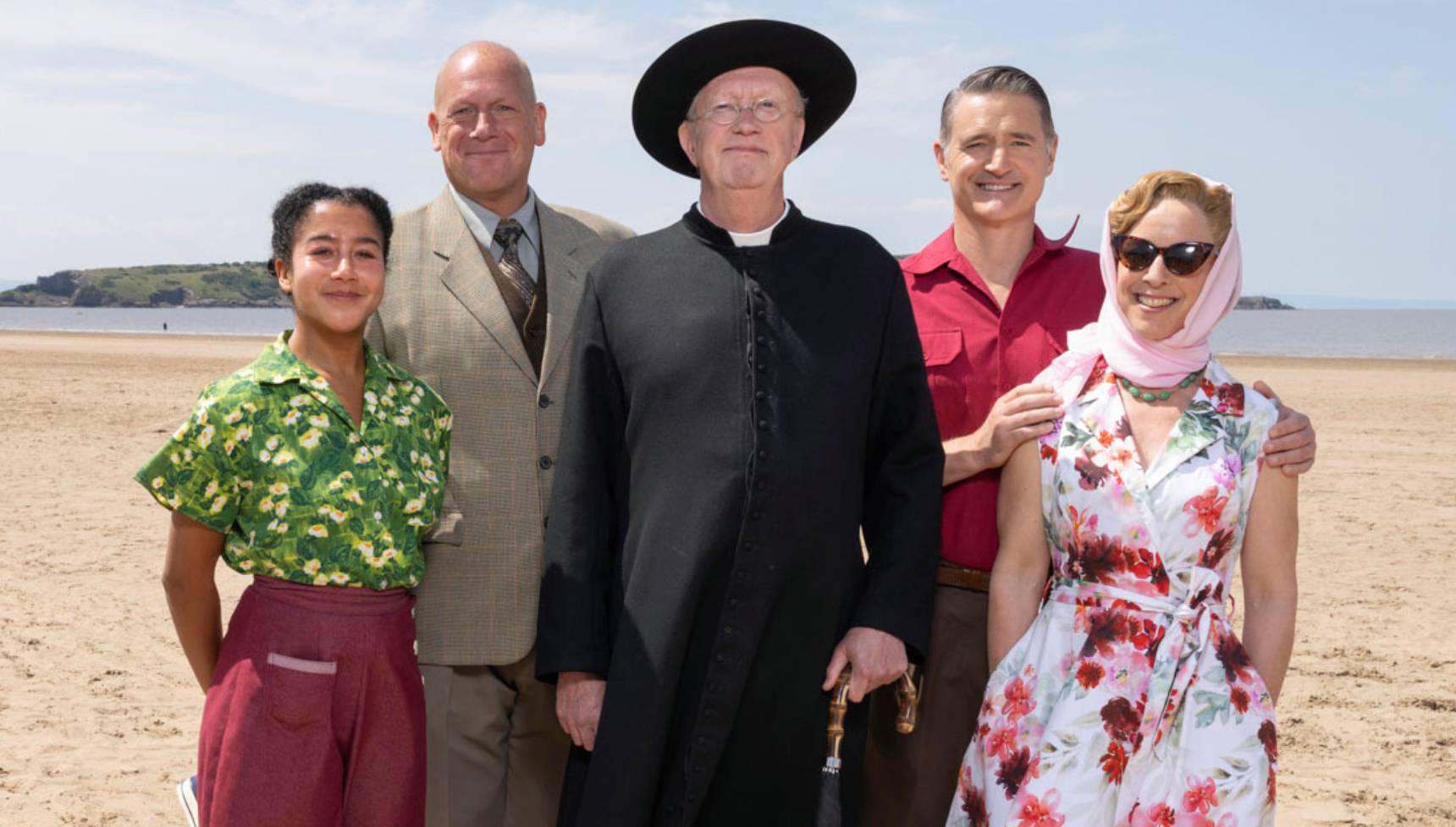 Brenda Palmer, Sgt Goodfellow, Father Brown, Inspector Edgar Sullivan, Mrs Isabel Sullivan on the beach in Father Brown series 13