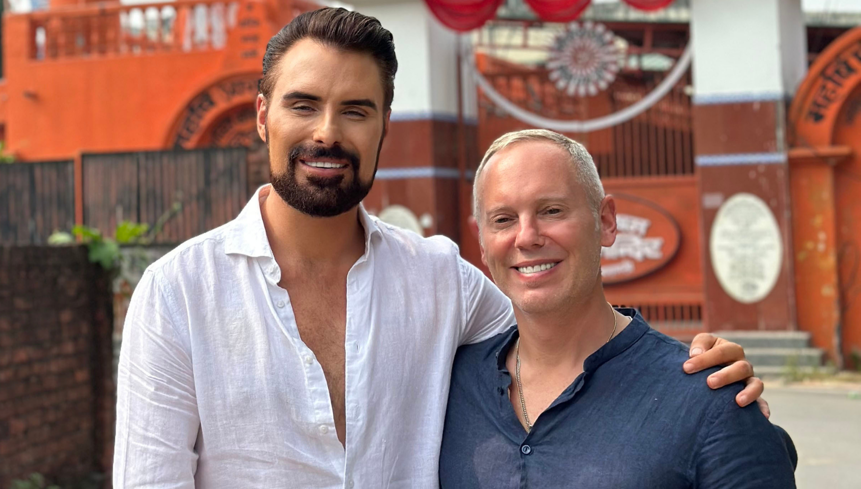 Rylan Clark and Rob Rinder smiling