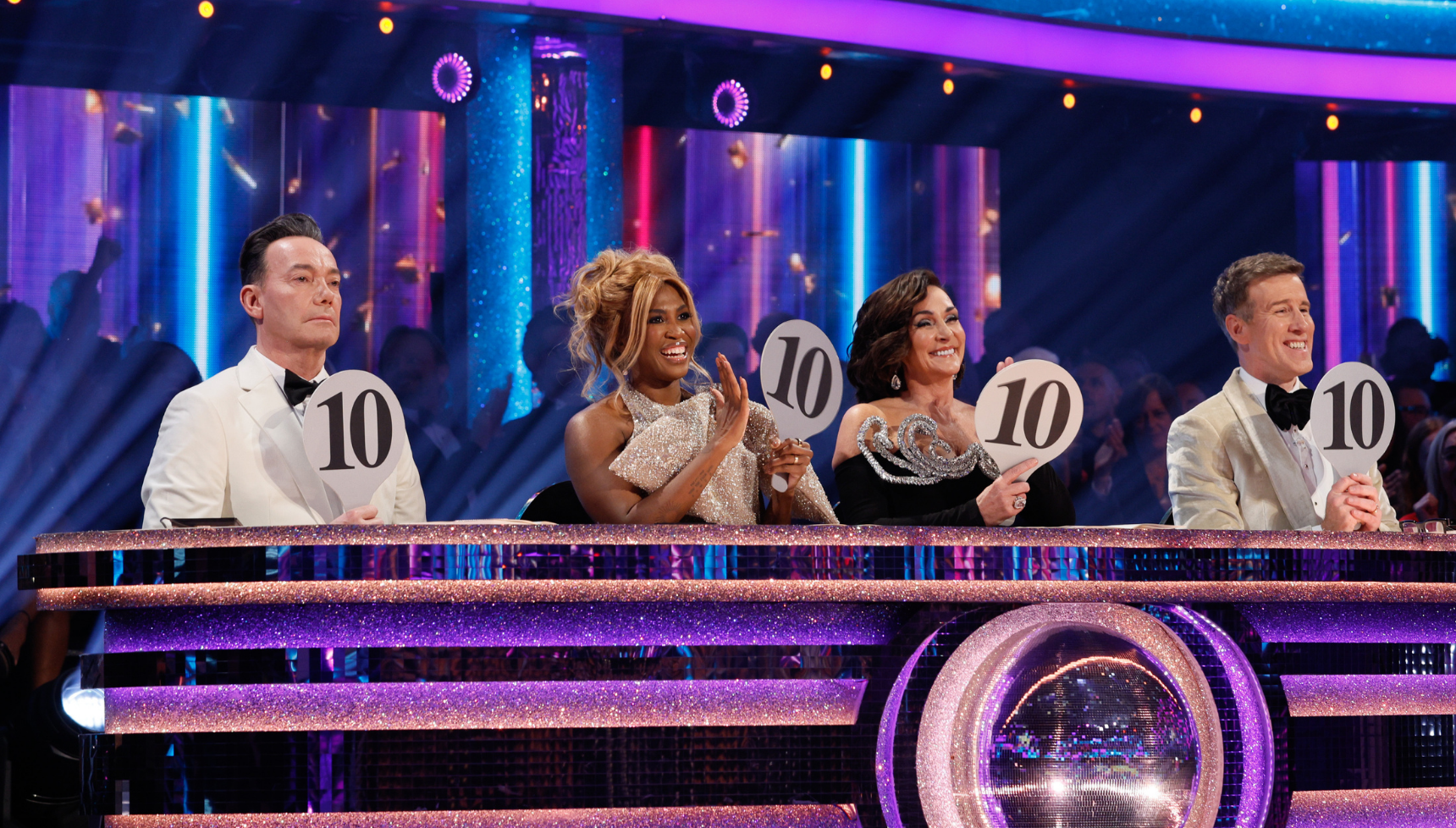 The Strictly judges holding 10 paddles