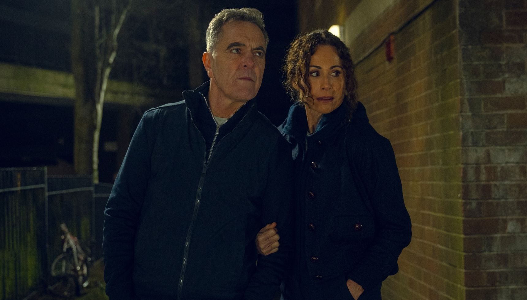 James Nesbitt and Minnie Driver on a dark housing estate in Run Away
