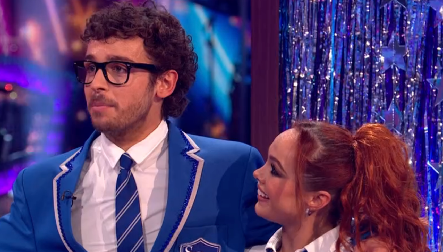 George and Alexis wearing blue school uniforms