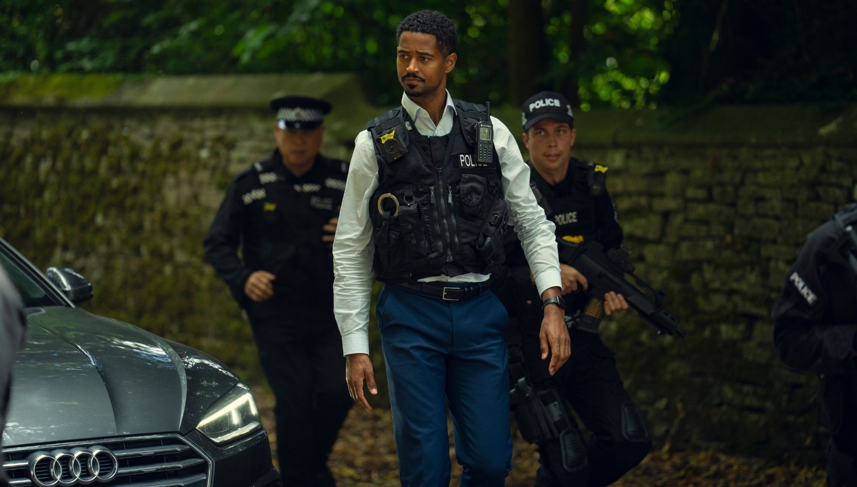 Isaac Fagbenle in oolice uniform in Run Away