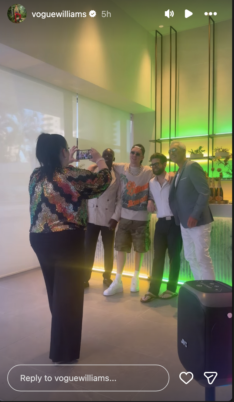 Lisa Riley taking a photo of Eddie Kadi, Aitch, Jack Osbourne, and Martin Kemp 