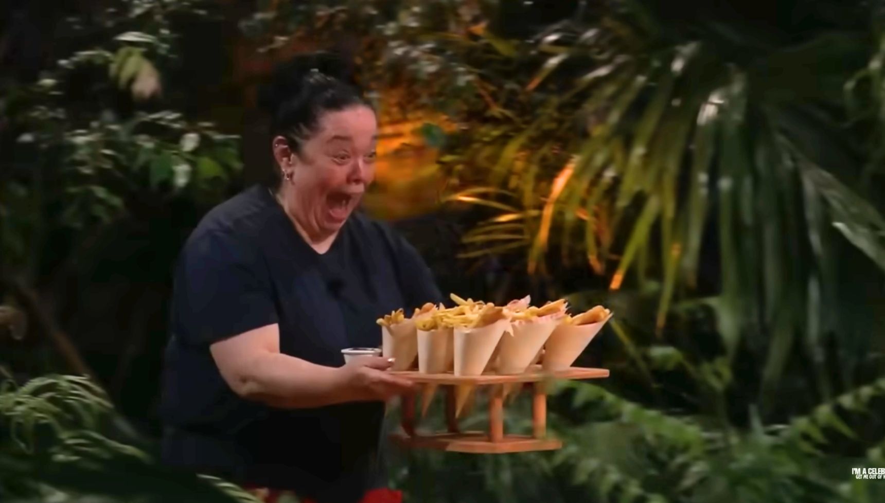 Lisa bringing the food in to Jungle Arms