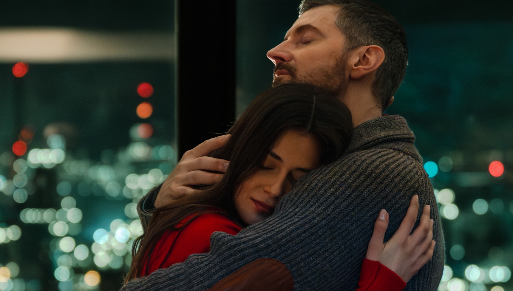 RICHARD ARMITAGE as Ethan Winter and CARLOTTA BANAT as Simone Edwards in Winter