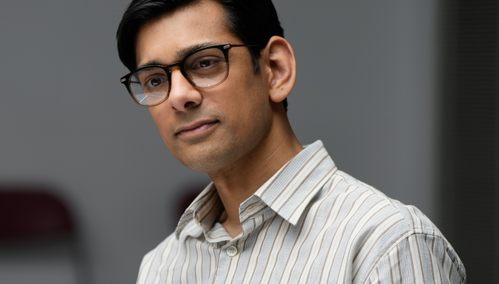 Amit Shah as Malcolm in The Revenge Club