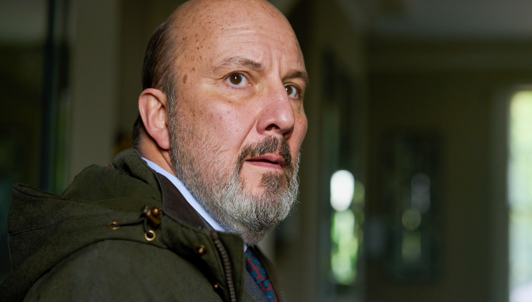 Paul Chahidi portrays Basil in The Night Manager