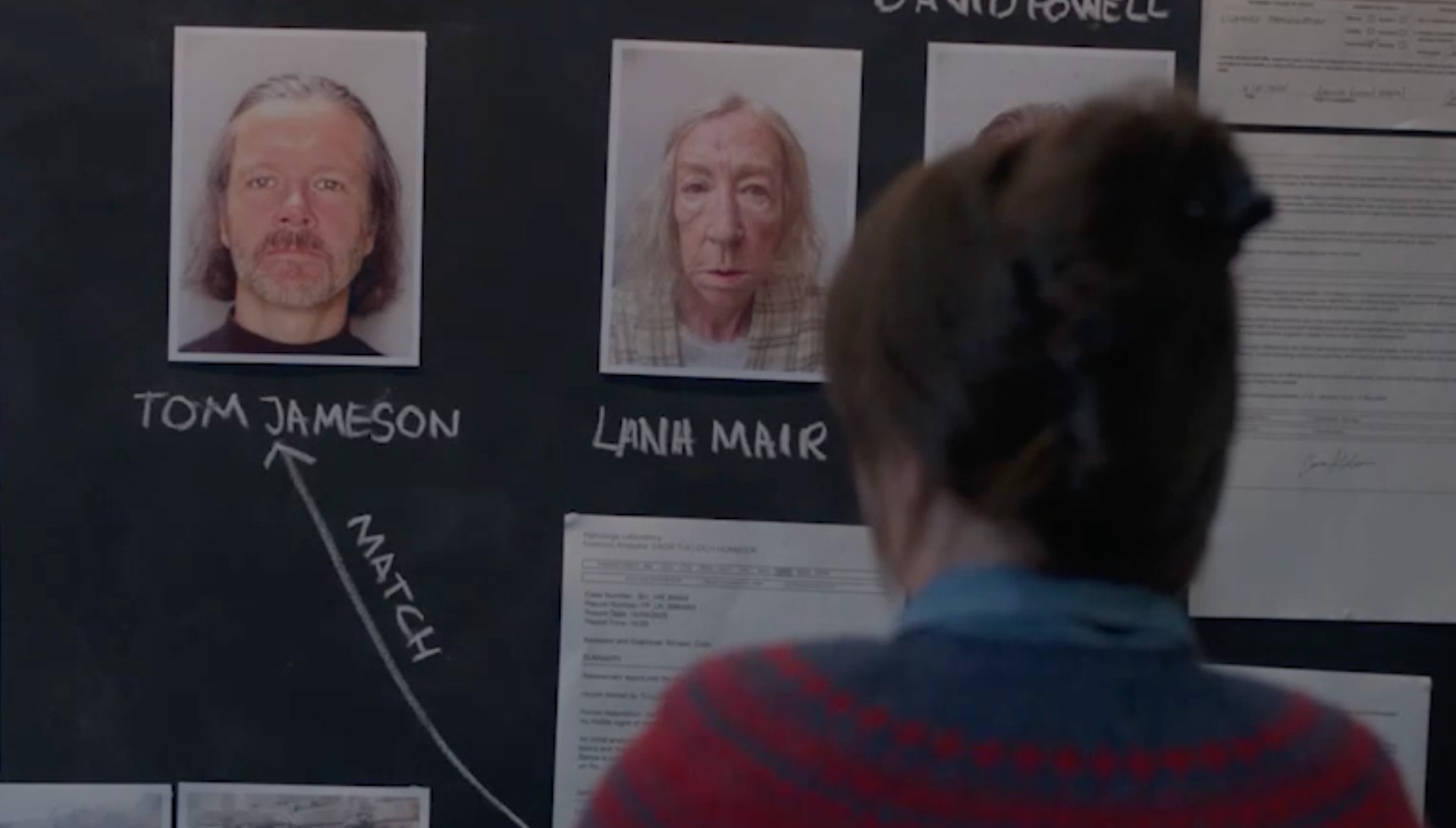 Tosh looking at the crime wall in Shetland