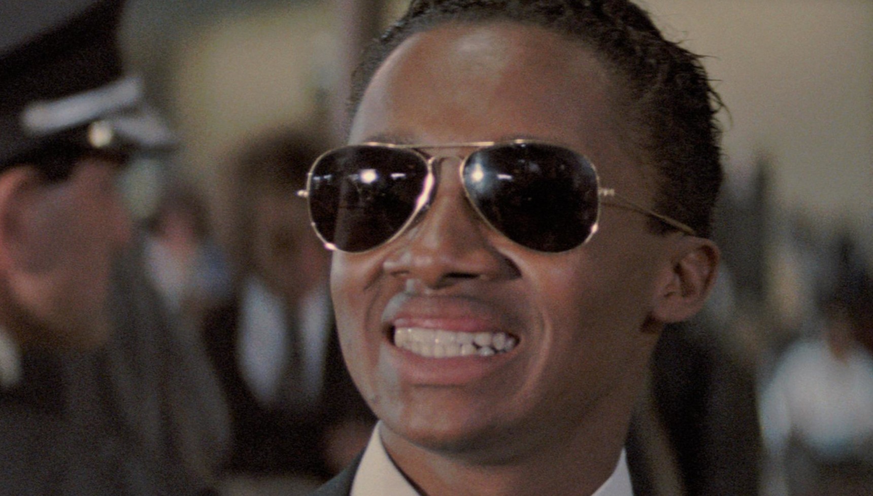 Argyle smiling in Die Hard