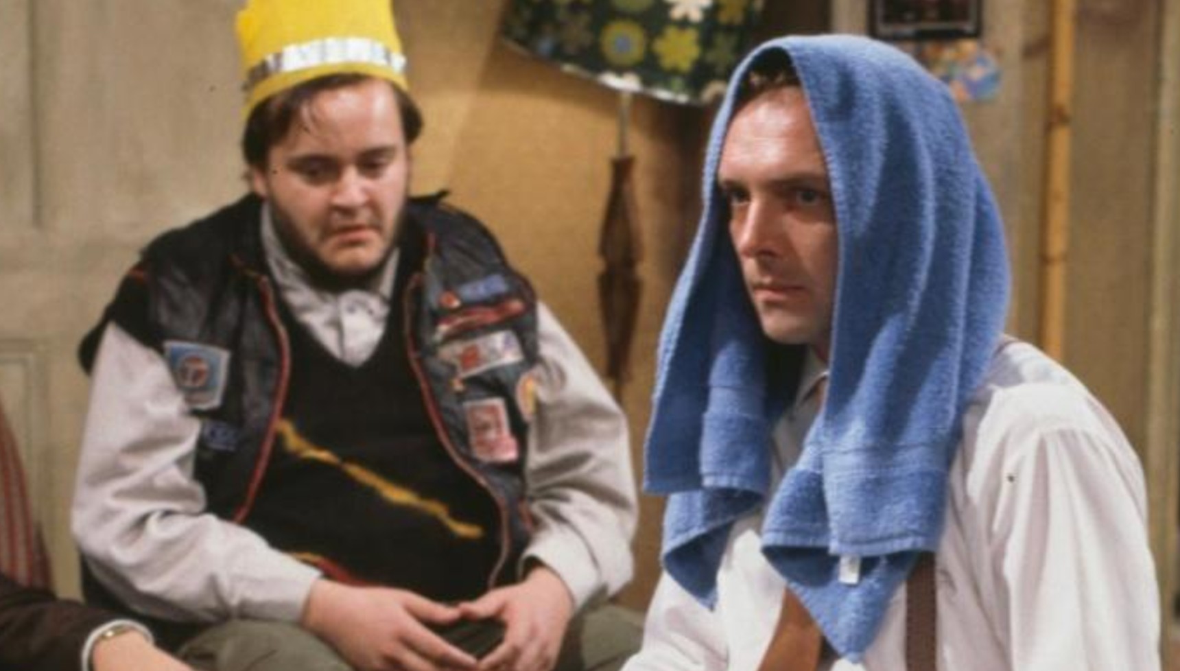 Rik Mayall with a towel over his head in Bottom