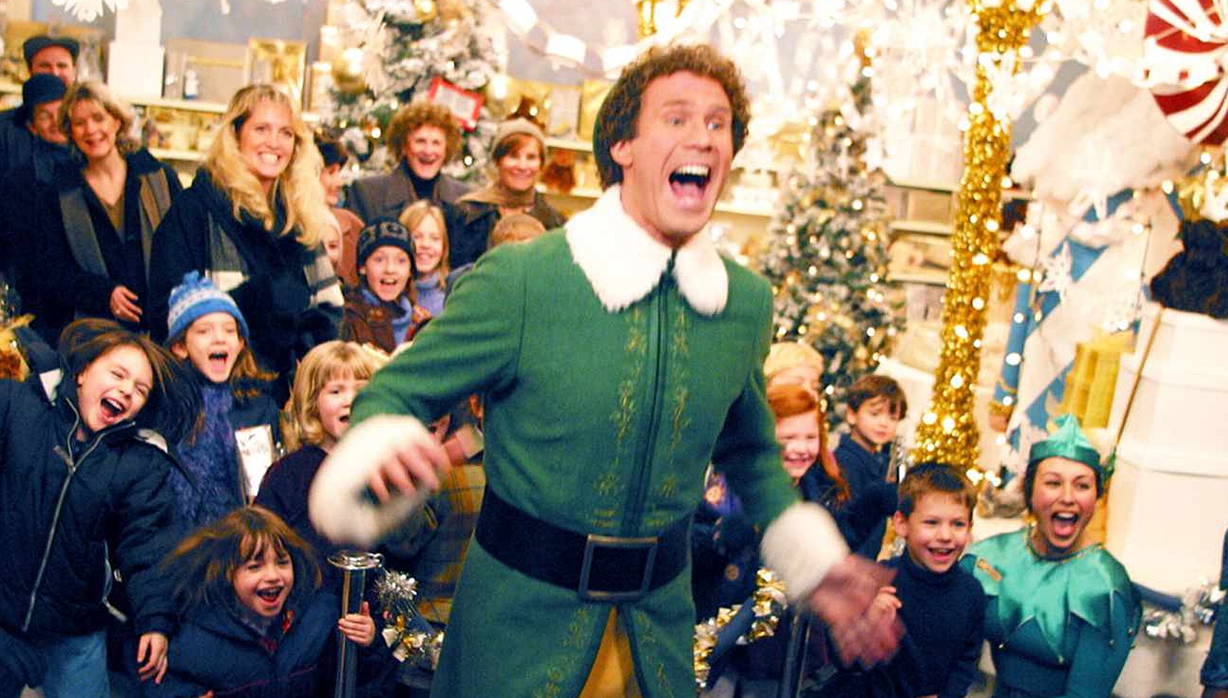 Will Ferrell's Buddy the Elf shouting in front of kids in a toy shop
