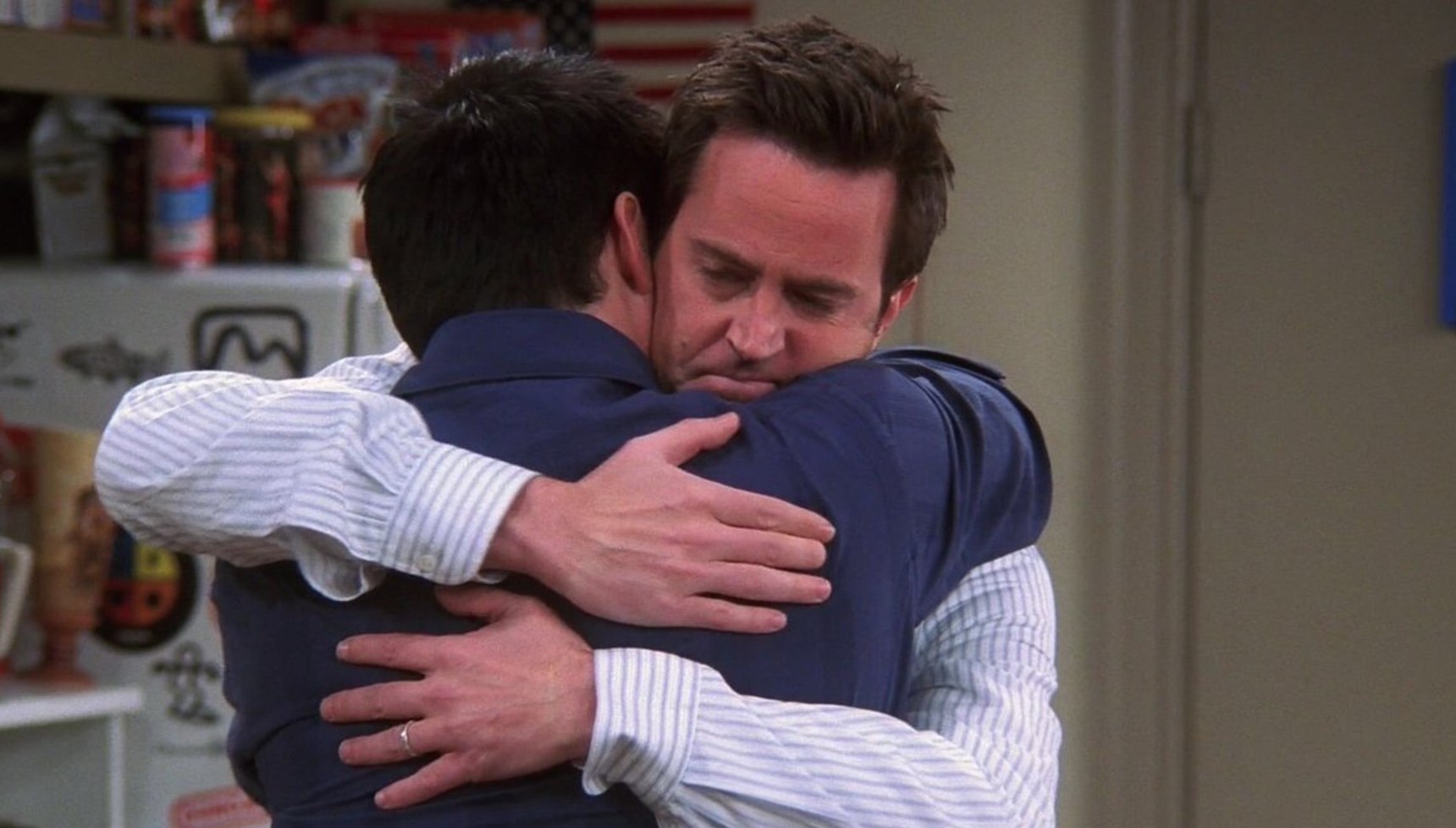 Chandler hugging Joey in Friends