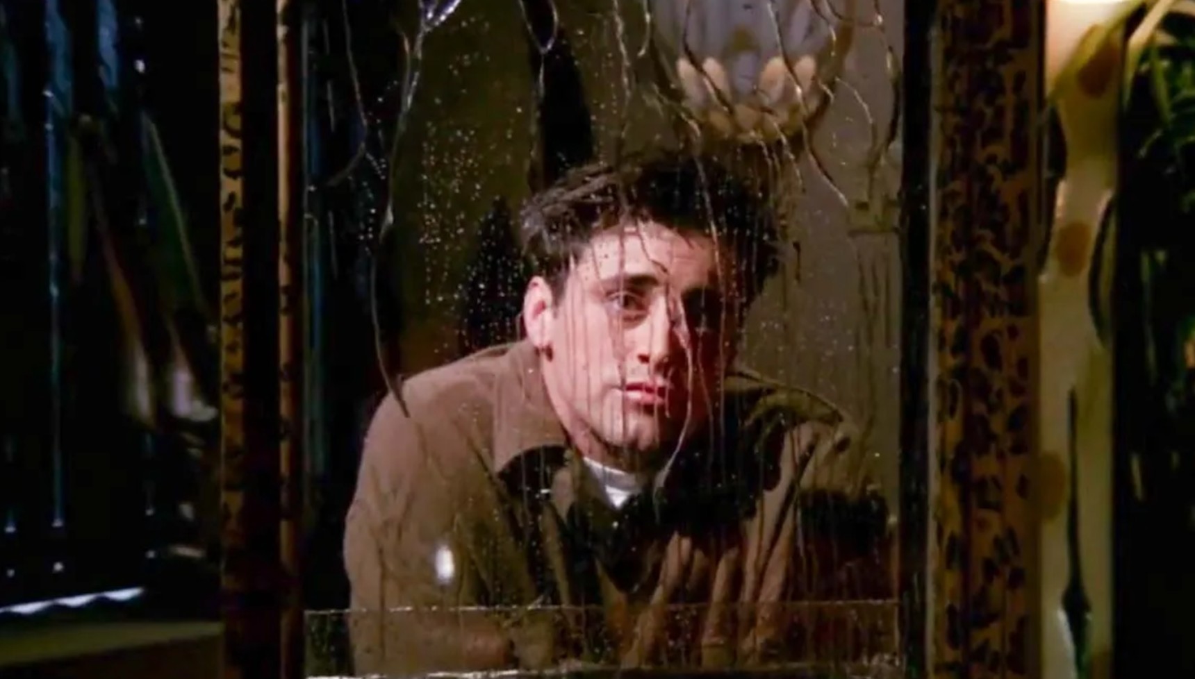 Joey looking at a water fountain in Friends