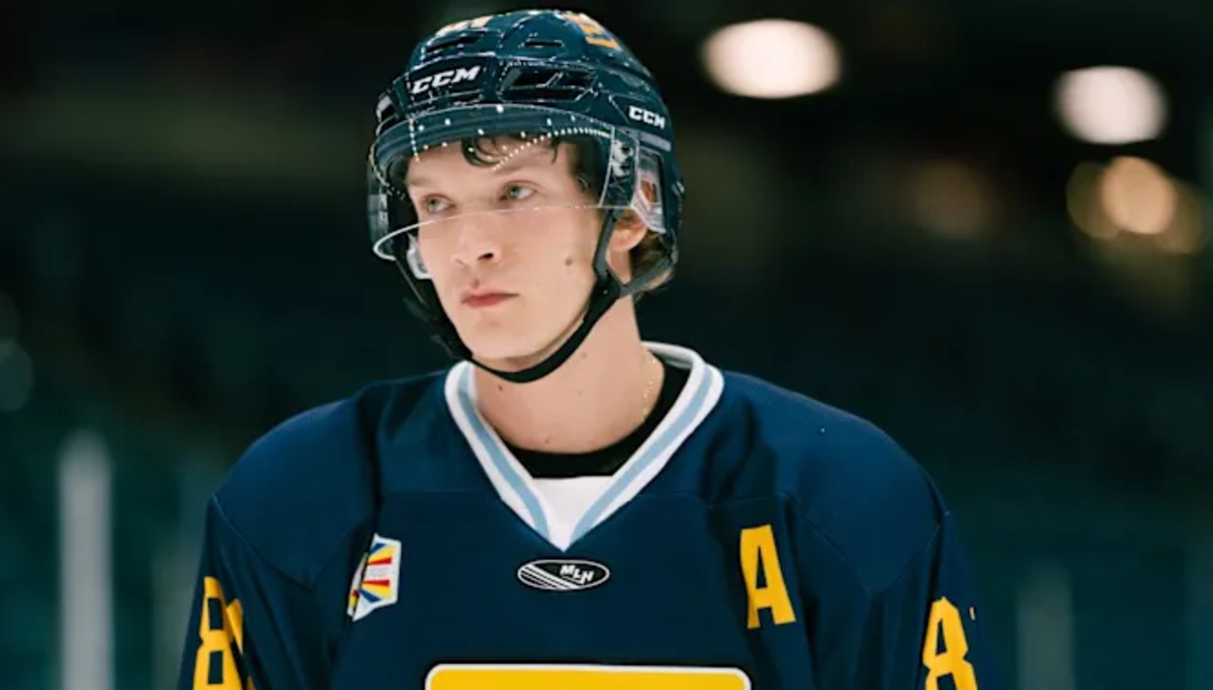 Ilya in a hockey uniform in Heated Rivalry 