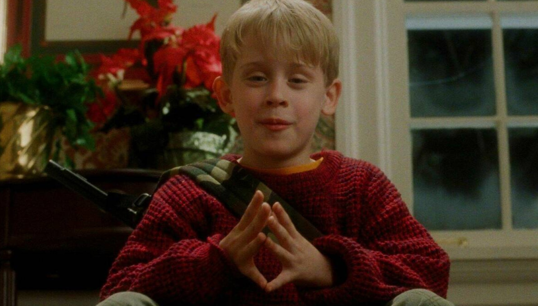 Kevin with his hands together in Home Alone
