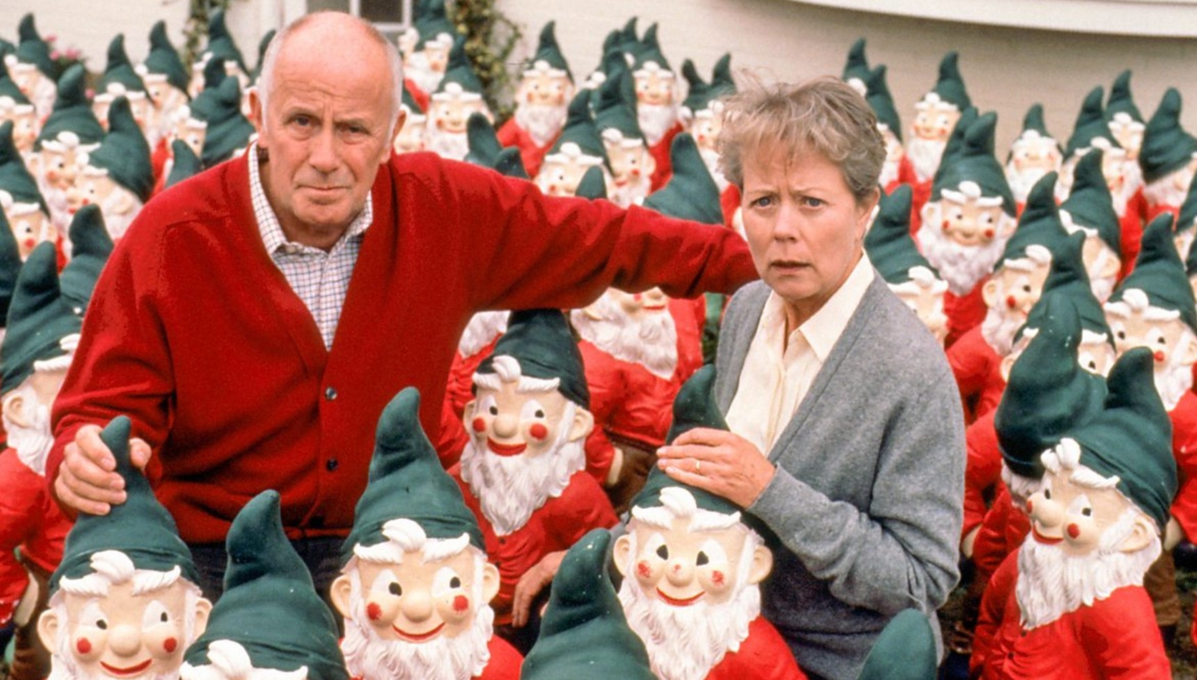 Victor and Margaret surrounded by garden gnomes in One Foot in the Grave