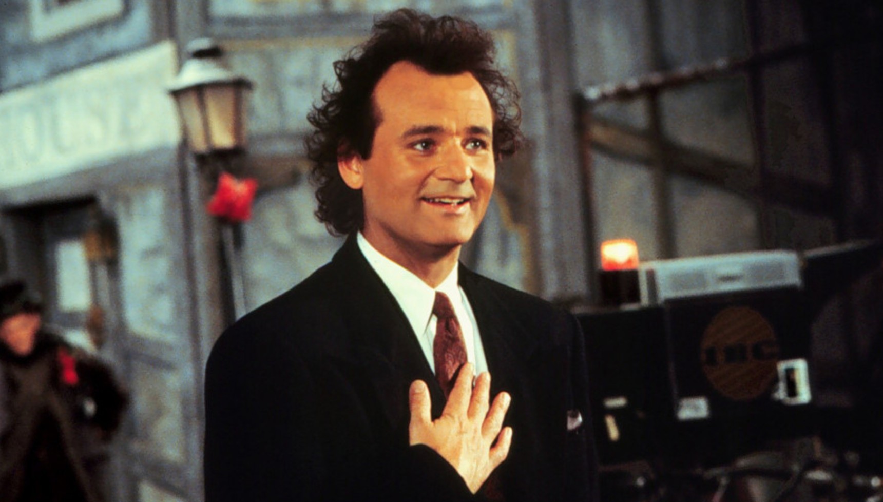 Bill Murray smiling in Scrooged