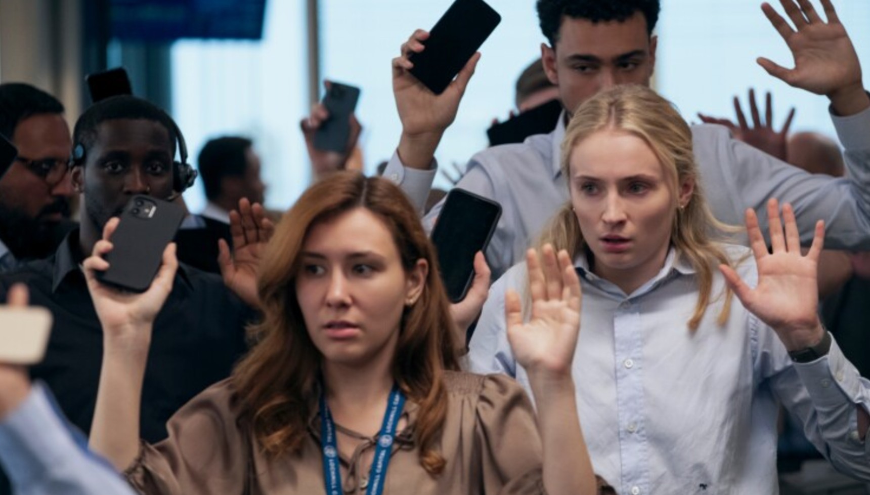 Sophie Turner holding her hands up in Amazon Prime Video's Steal