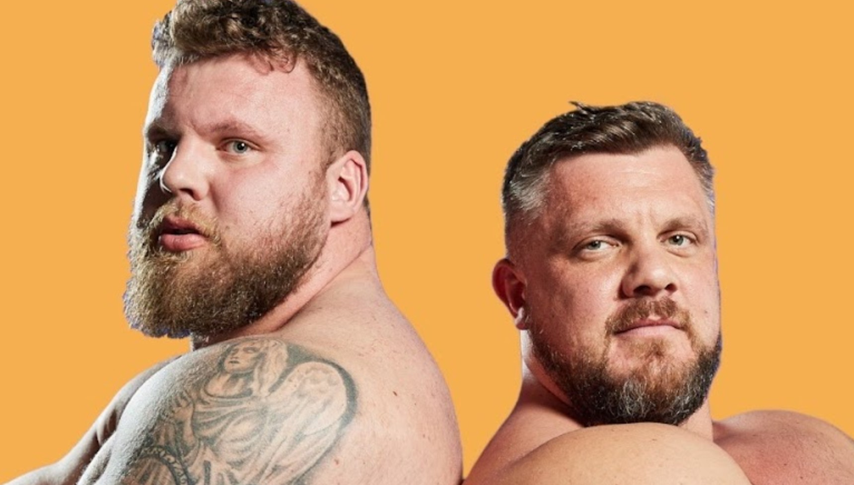 Luke and Tom Stoltman standing back to back