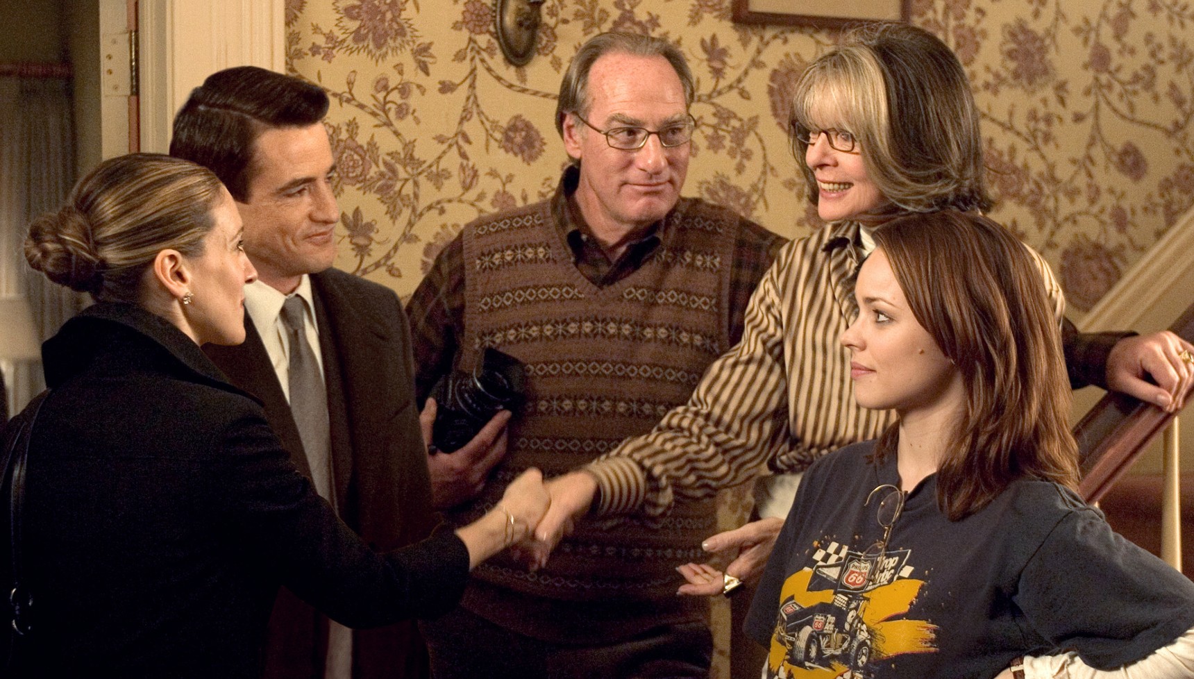 Sarah Jessica Parker shaking hands with Diane Keaton next to Dermot Mulroney, Craig T. Nelson and Rachel McAdams